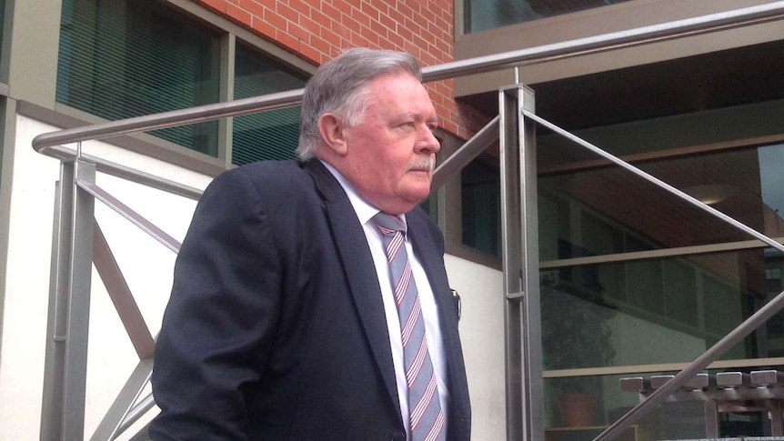 Tasmanian Director of Public Prosecution Tim Ellis arrives at court in Hobart, March 26.