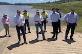 group of politicians standing on boat ramp at paradise dam