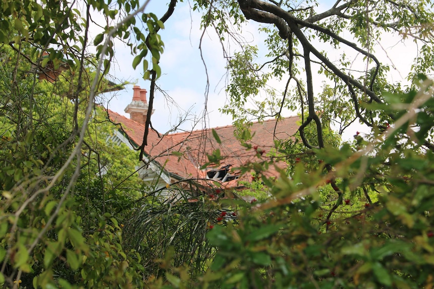 A home with a hole in the roof.