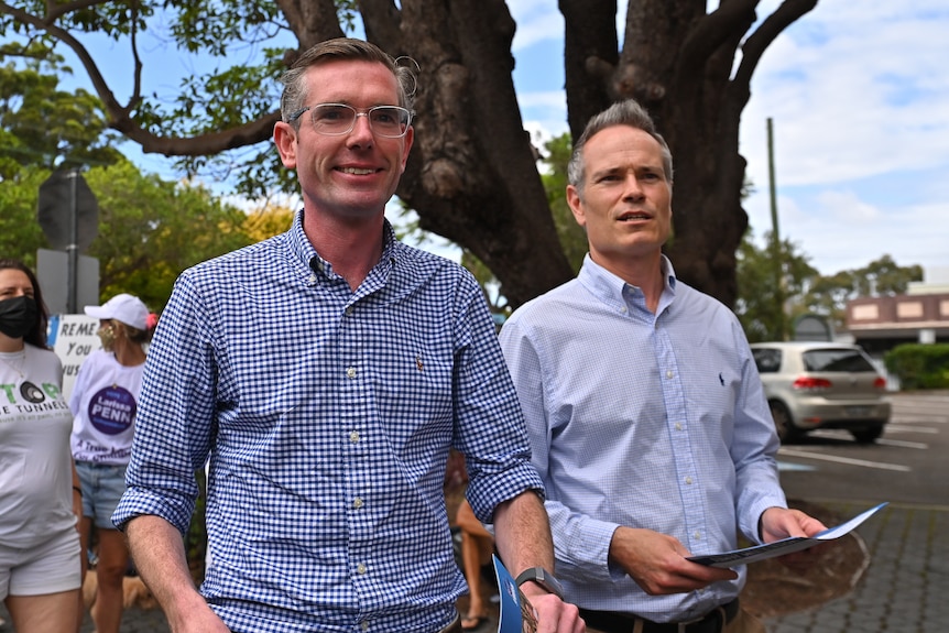 Two men walking and smiling 