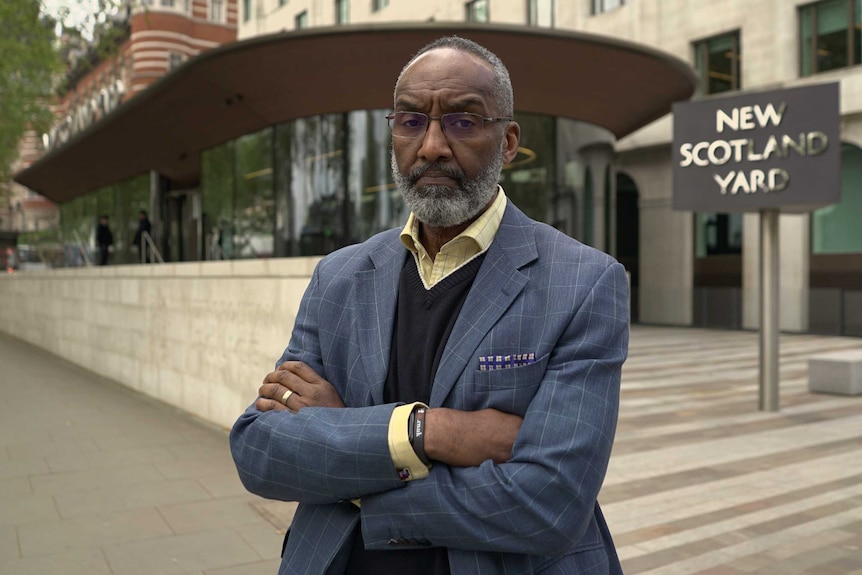 Retired Metropolitan Police Superintendent Leroy Logan stands outside New Scotland Yard