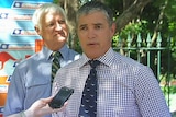 Robbie Katter (front) and father Bob Katter respond to the election announcement.