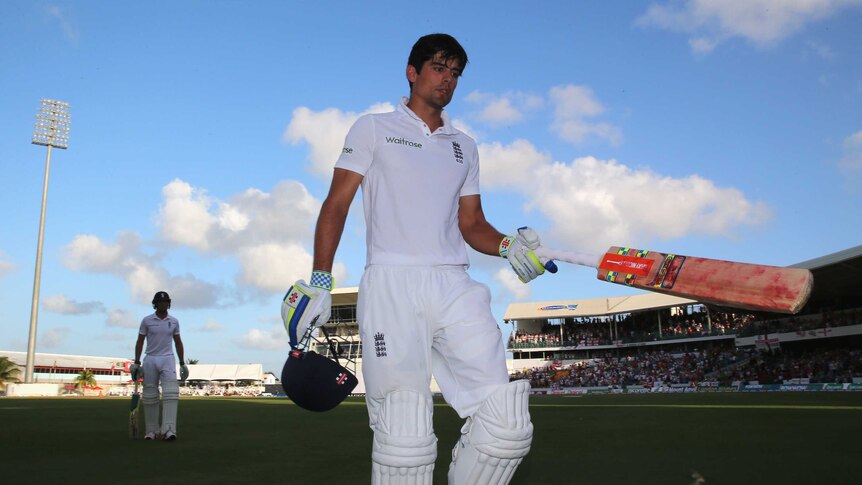 Timely ton ... Alastair Cook walks off after scoring a century against West Indies