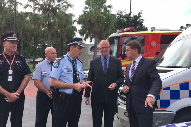 Assistant Commissioner Michael Keating (middle) with the Police Minister and Health Minister