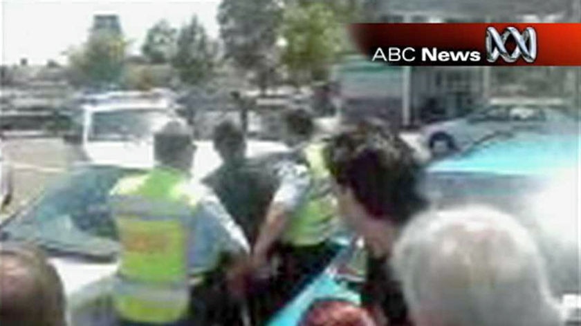 Members of the public chased and tackled the man alleged to have robbed a bank at Plumpton in Sydney's west yesterday.