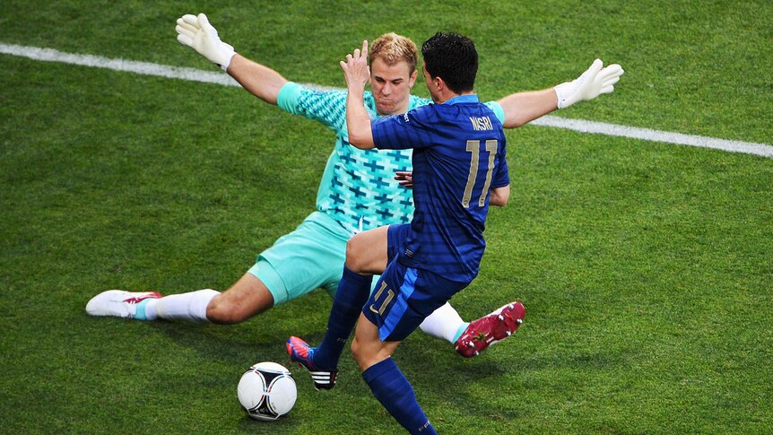 England goalkeeper Joe Hart blocks France's Samir Nasri during their 1-1 draw in their Euro Group D match in Ukraine.