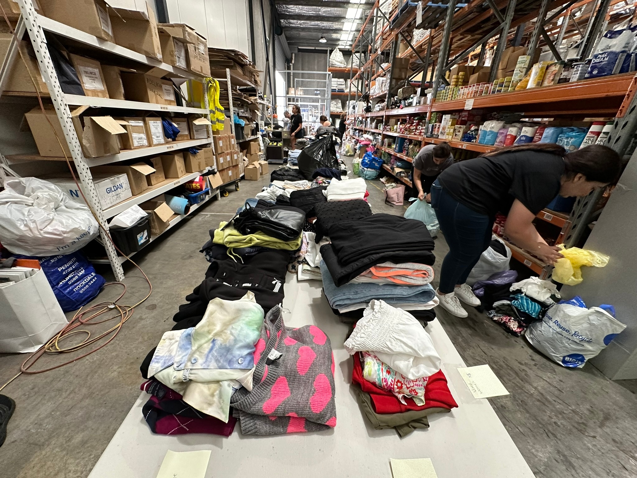 A view of a warehouse in Sydney being used to store donations.