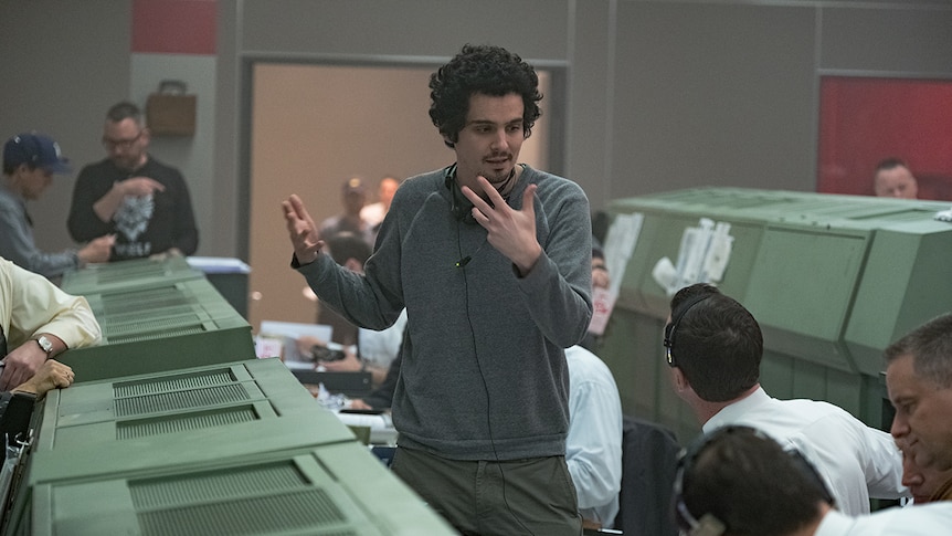 Production photo of director Damien Chazelle on the set of his 2018 First Man.