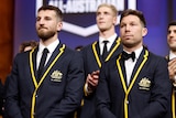 Marcus Bontempelli and Toby Greene stand next to each other, wearing blazers that say "All Australian"