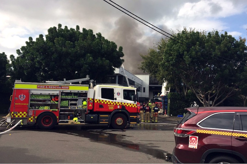 Smoke rises from a factory