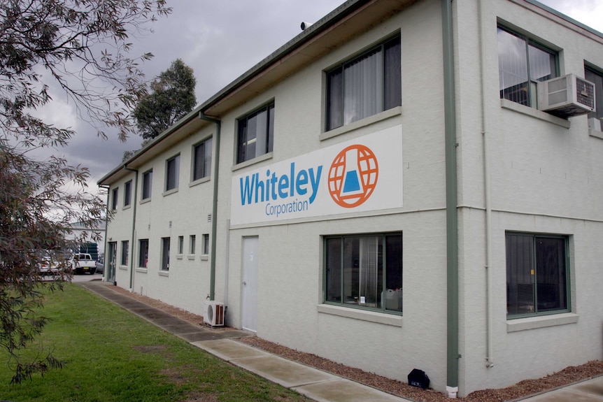 A building with a Whiteley Corporation sign