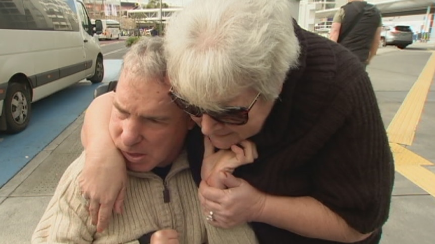 Sue McDermott hugs her son Shaun outside an airport.