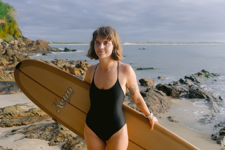 woman with surf board 