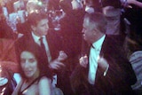 Malcolm Turnbull, right, and Andrew Charlton speak at the press gallery mid-winter ball