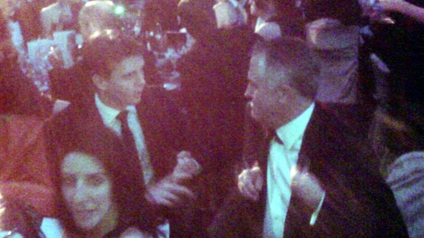 Malcolm Turnbull, right, and Andrew Charlton speak at the press gallery mid-winter ball