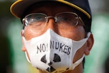 A man gets his message across at anti-nuclear rally in Tokyo