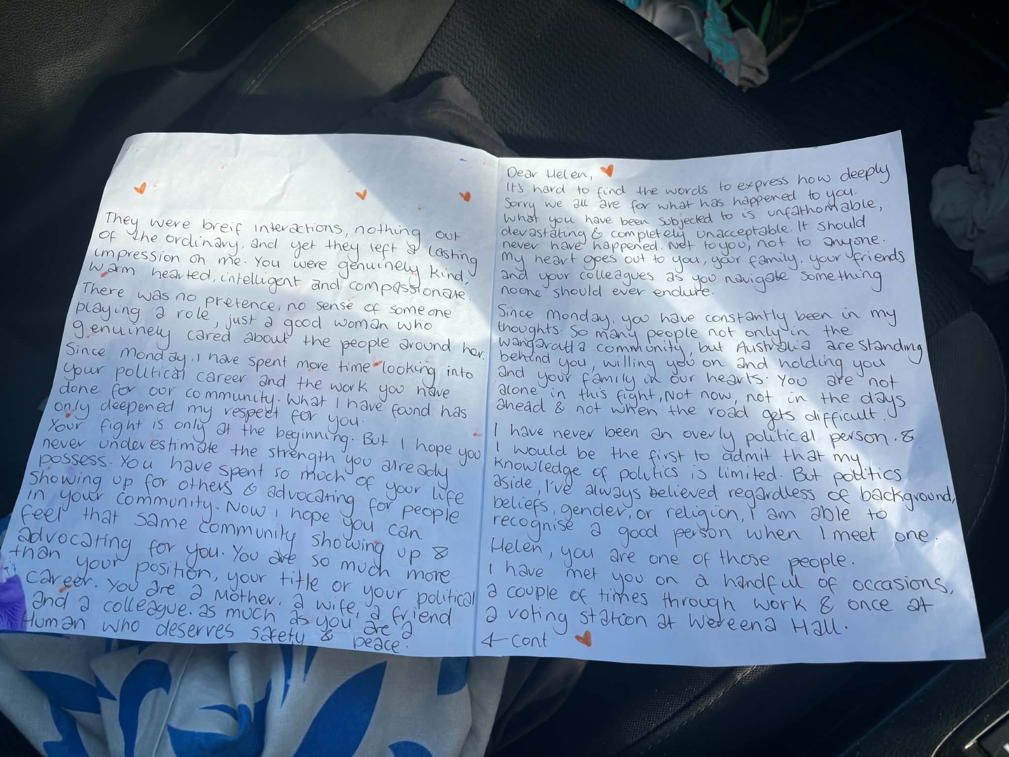 A handwritten letter outside an office.