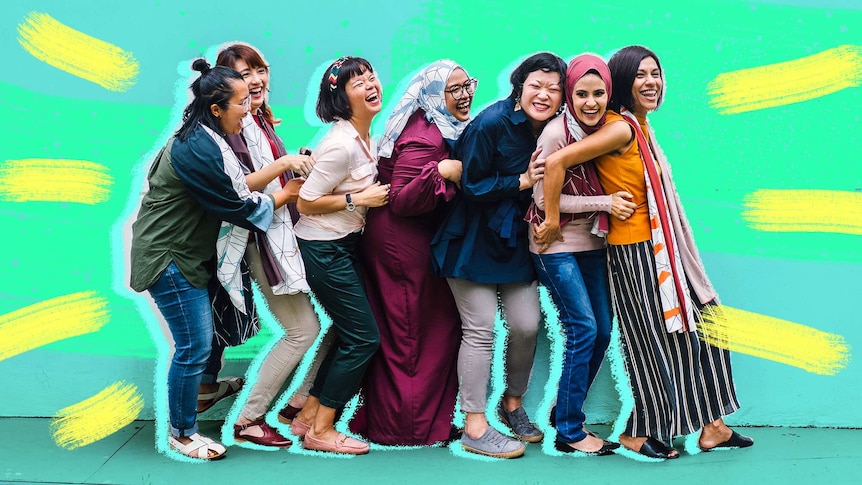 Group of woman laughing in a line up