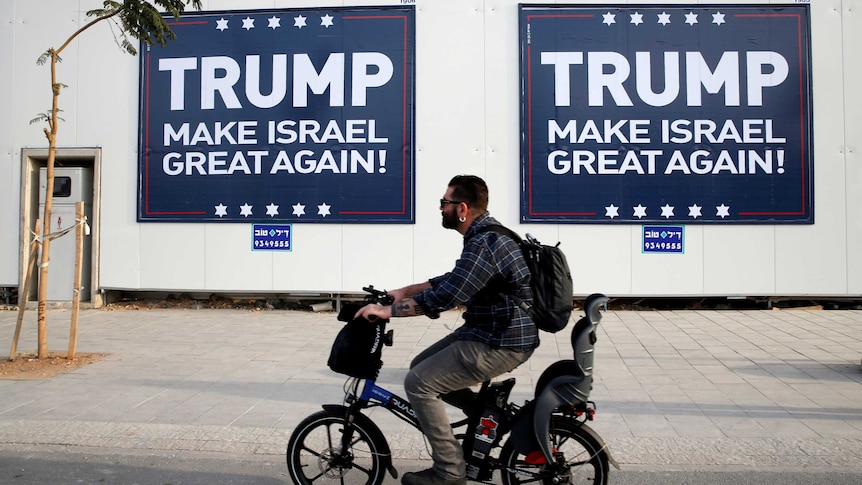 Signs read 'Make Israel Great Again' in Tel Aviv.