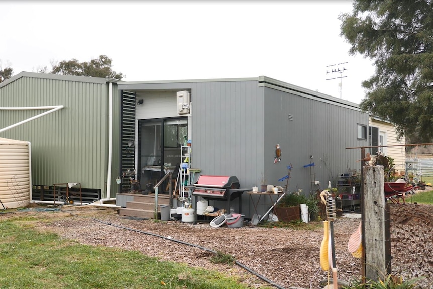 small modular house attached to shearing shed