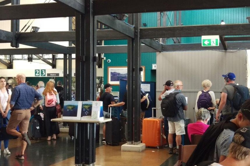 Stranded Australian travellers on Norfolk Island getting ready to fly home.