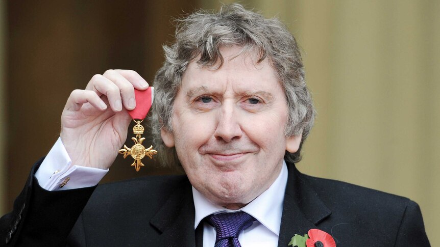 James herbert poses with OBE