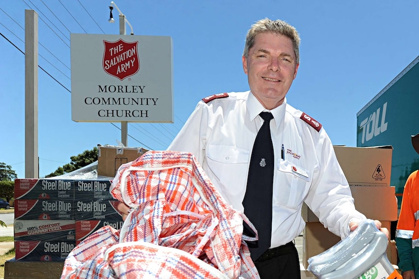 Geoff Freind with donated goods outside The Salvation Army's Morley Community Church.