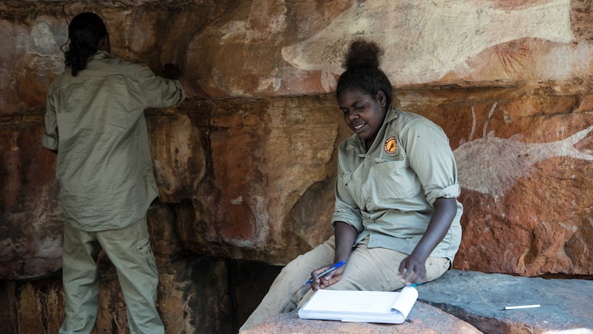 Female rangers catalogue newly uncovered rock art in Arnhem Land.