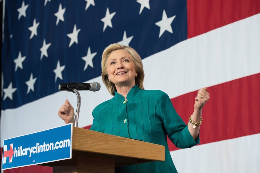 Presidential hopeful Hillary Clinton standing at a podium.