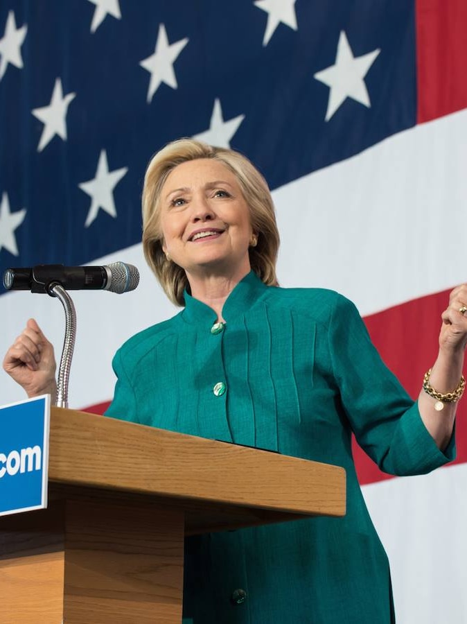 Presidential hopeful Hillary Clinton standing at a podium.