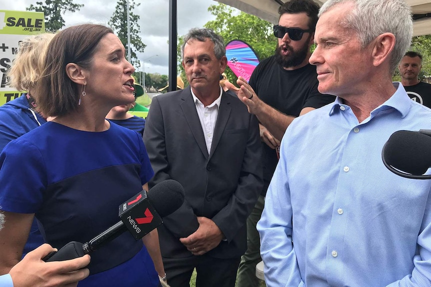 Queensland Council of Unions general secretary Ros McLennan confronts One Nation Ipswich candidate Malcolm Roberts.