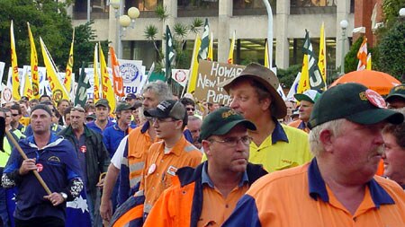 Tens of thousands of people have rallied peacefully several states against proposed industrial relations changes.