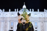 Image of Panda projected onto facade of St Peter's Basilica