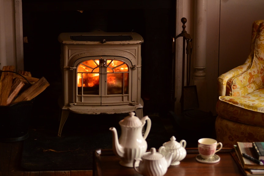 A wood heater in a house.