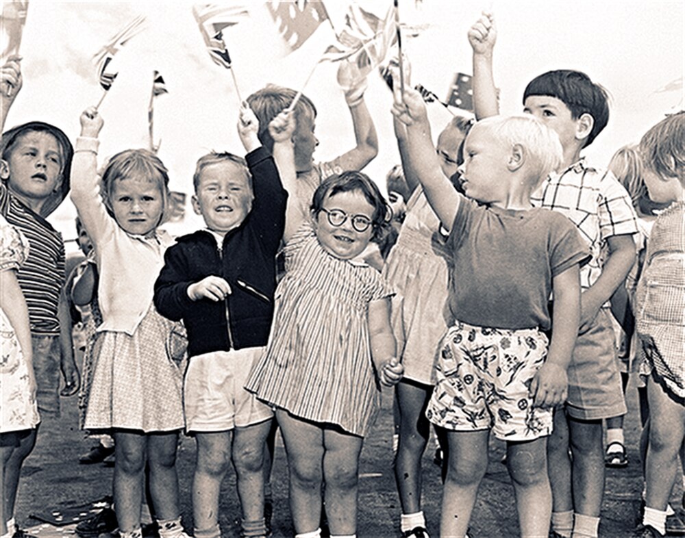 Young fans greet the Queen at Fairbairn Airport, Canberra on her first tour of Australia in 1954.