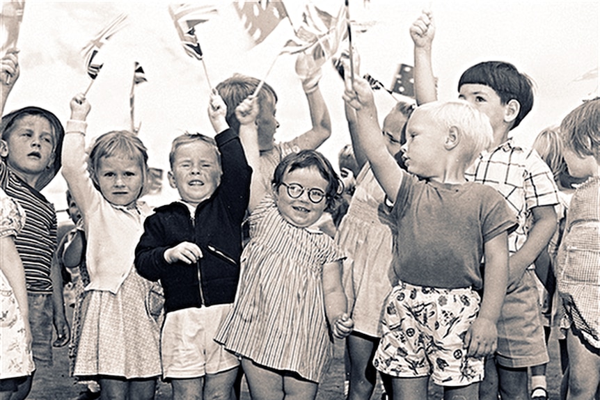 Young fans greet the Queen at Fairbairn Airport, Canberra on her first tour of Australia in 1954.