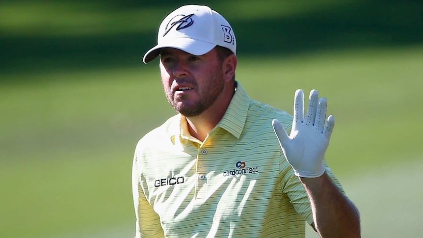 Robert Garrigus acknowledges the crowd during the third round of the Tampa Bay Championship.