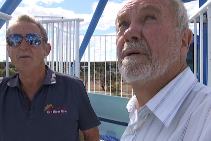 Graeme Robertson and John Bell on the top of a waterslide