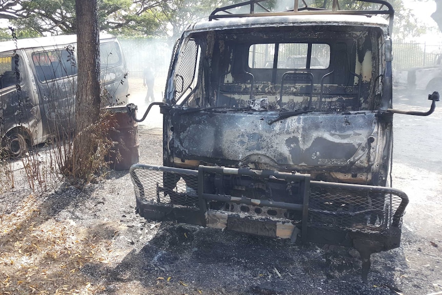 Burnt out vans at UPNG campus