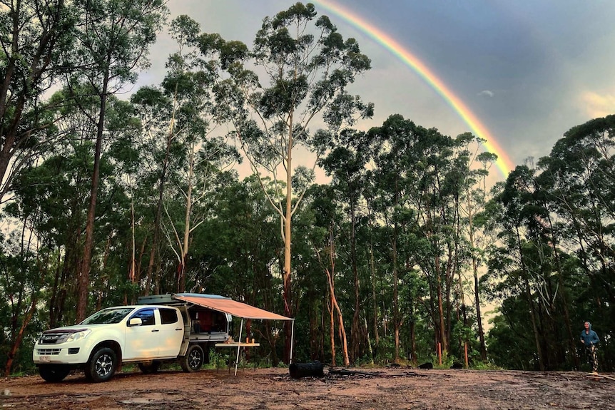 A 4WD and campsite set up at Lower Bucca State Forest,