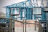 The frame of a house under construction.