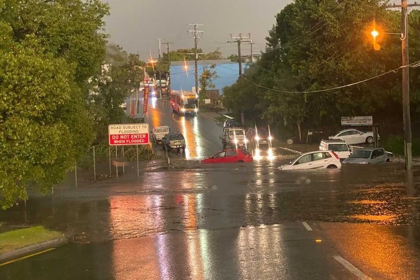 Flooding on Station Road at Yeerongpilly on Brisbane's southside during storms.