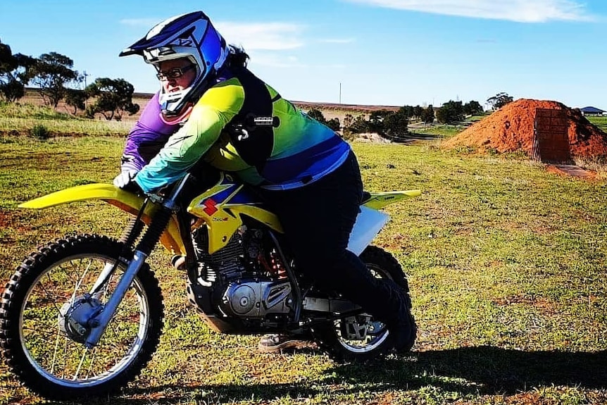 Daisy Hoskins current on a motorbike