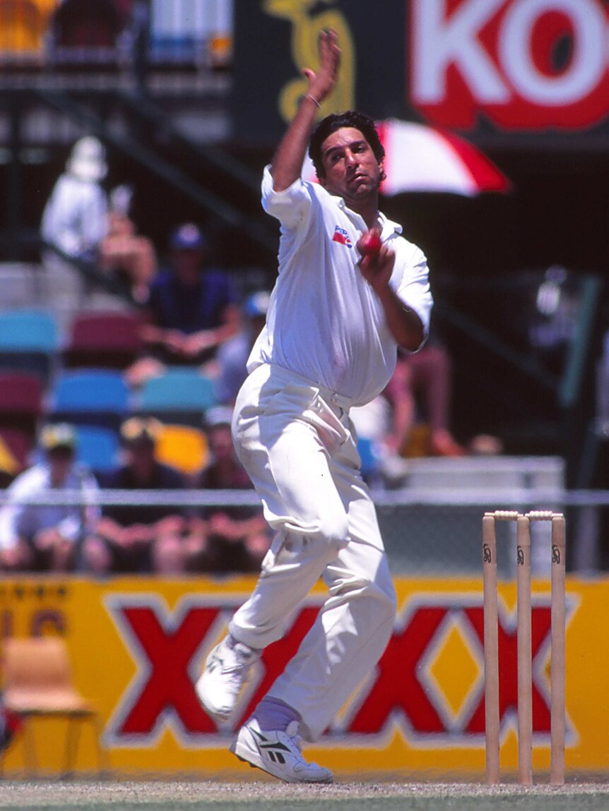 Wasim Akram bowls during a Test against Australia