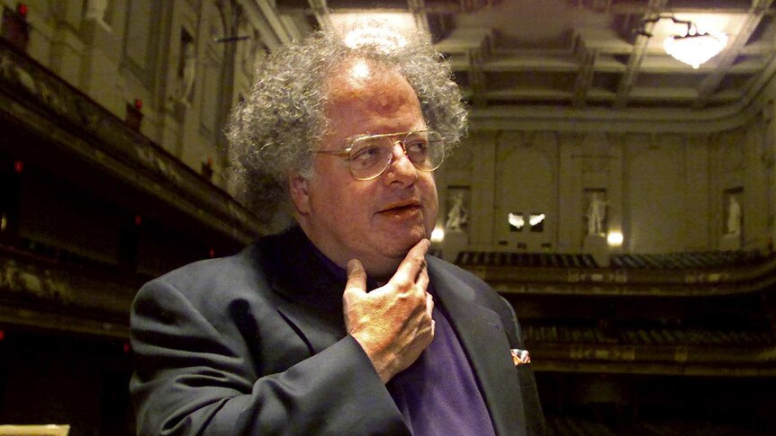 James Levine pauses as he looks over the stage at Boston's Symphony Hall.