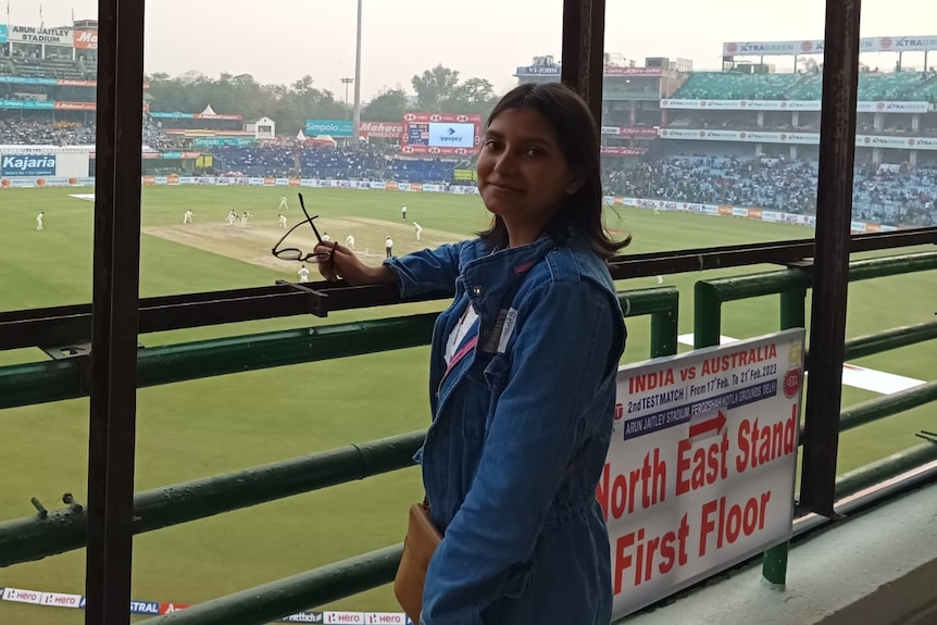 Ritu Sinha poses for a photo at an India V Australia Test Match.