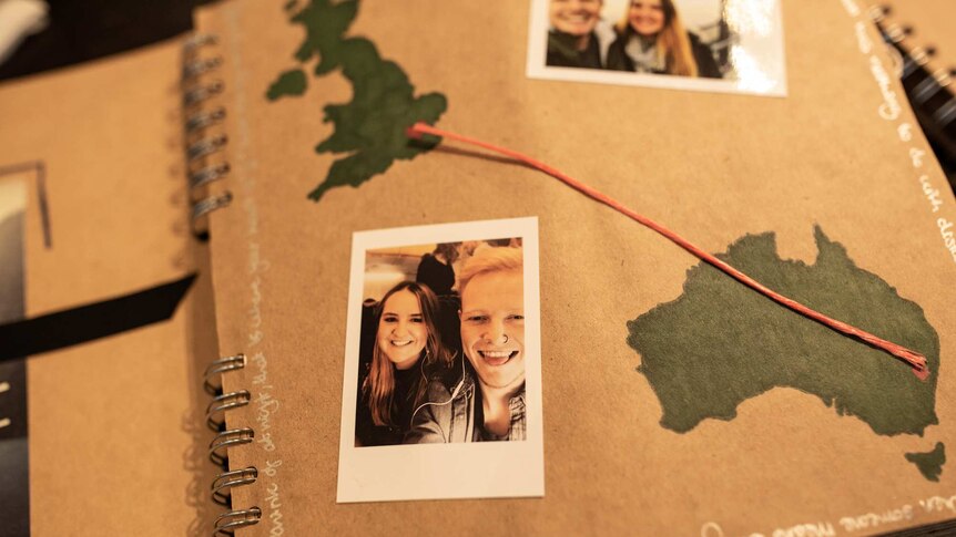 small photo of smiling couple in a brown paper diary
