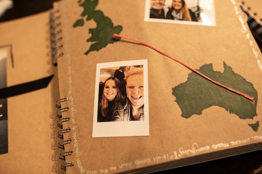 small photo of smiling couple in a brown paper diary