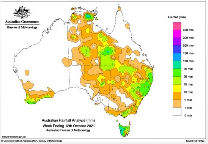 Map of Aus with green rain patches from the top end to the south-east. 