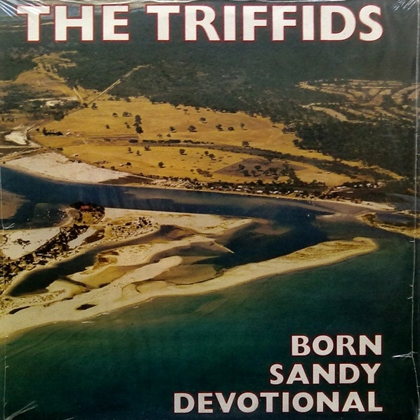 Record cover featuring an aerial photo of a sandy beach.